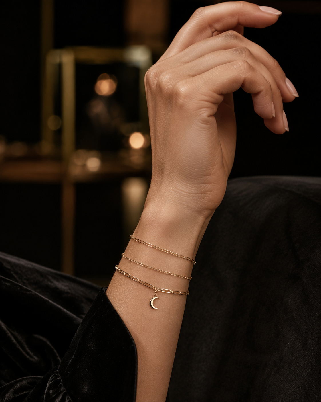 Delicate gold permanent bracelets with a moon charm